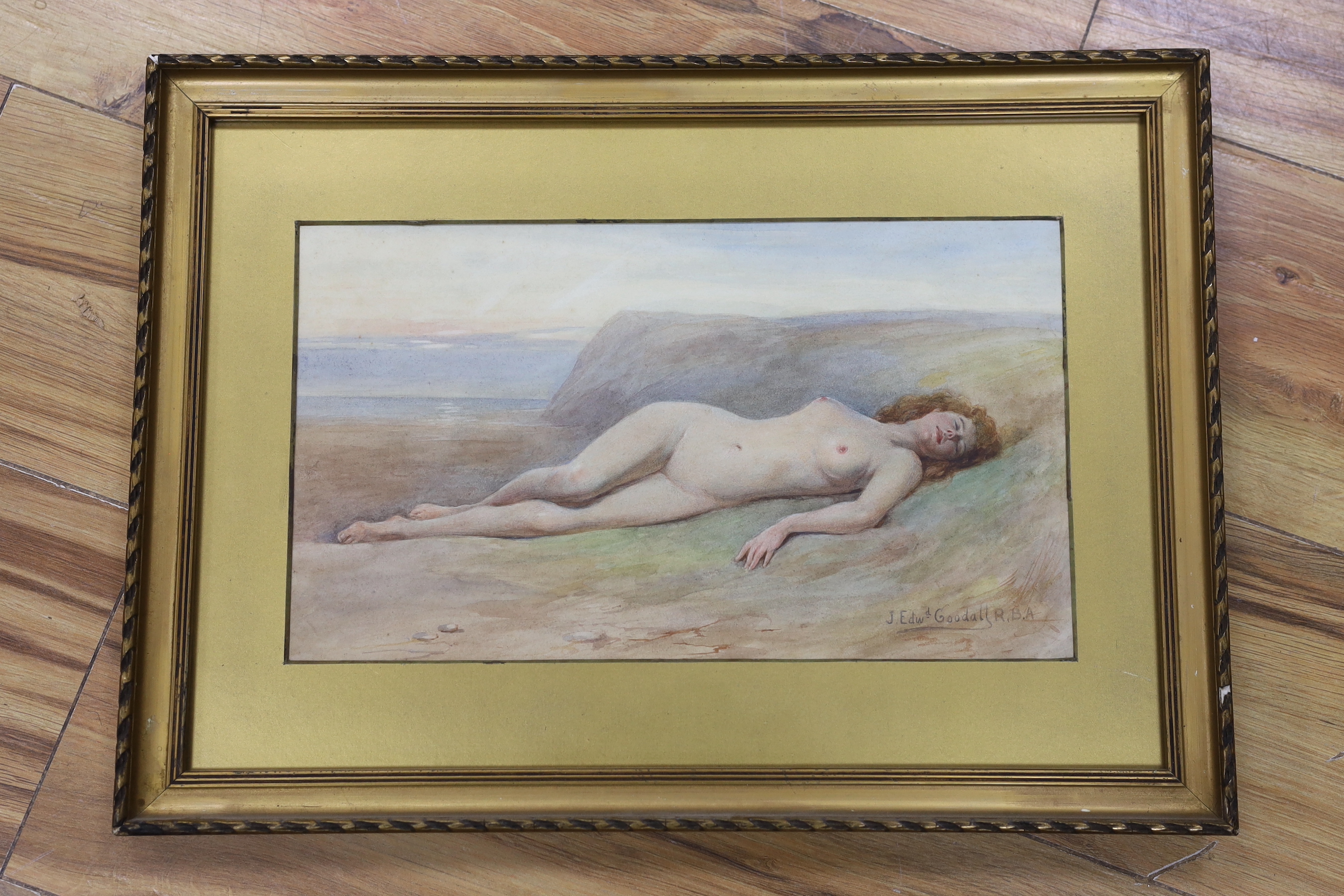 John Edward Goodall (1853-1920), watercolour, Nude reclining upon the seashore, signed, 19 x 33cm